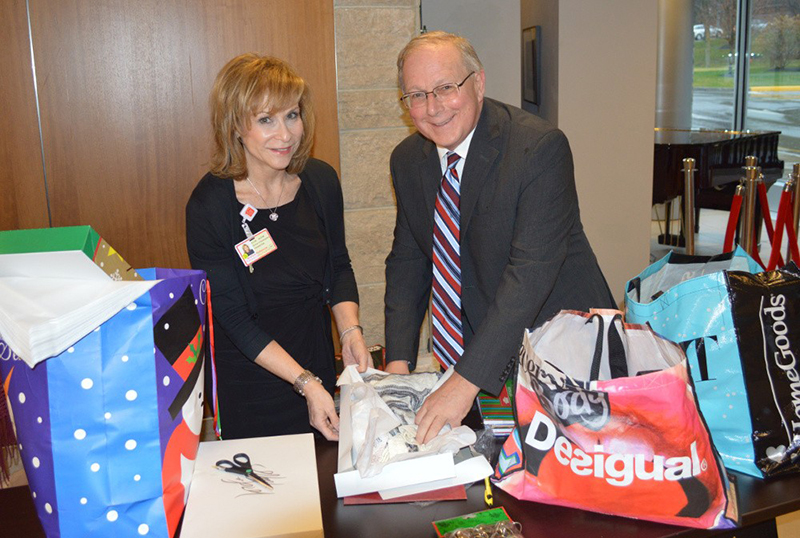Santa’s Helpers Wrapping Party attendees Ellen Bloom and George Oros
